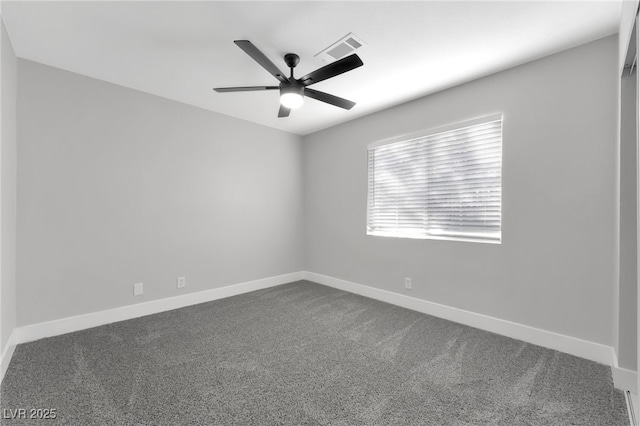 5453 Yvonne Cir, Las Vegas, NV 89122 - empty room featuring dark colored carpet and ceiling fan