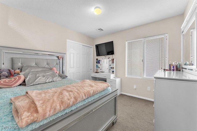 7852 Running Doe Ct, Las Vegas, NV 89149 - bedroom featuring carpet flooring, baseboards, and a closet