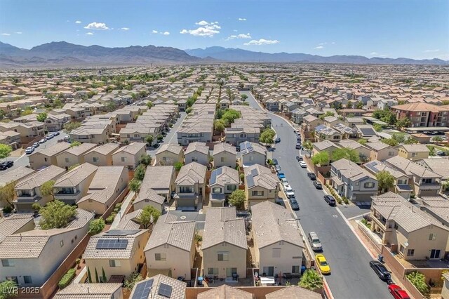 7852 Running Doe Ct, Las Vegas, NV 89149 - aerial view of residential area featuring a mountain backdrop