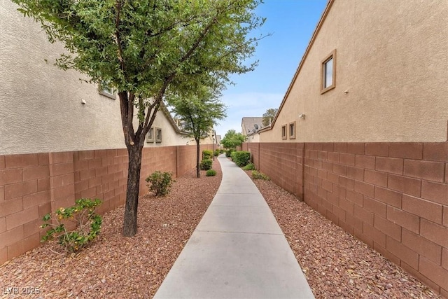7852 Running Doe Ct, Las Vegas, NV 89149 - view of home's community with a fenced backyard