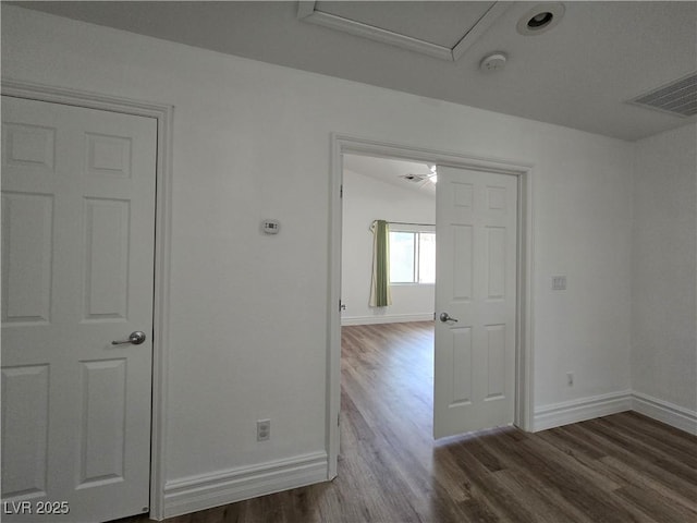 6638 Babys Tear Pl, Las Vegas, NV 89148 - empty room with wood finished floors, baseboards, and a smoke detector