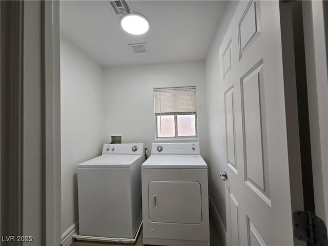 6638 Babys Tear Pl, Las Vegas, NV 89148 - laundry room featuring separate washer and dryer and baseboards