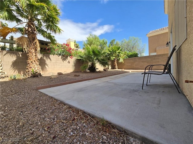 6638 Babys Tear Pl, Las Vegas, NV 89148 - fenced backyard with a patio