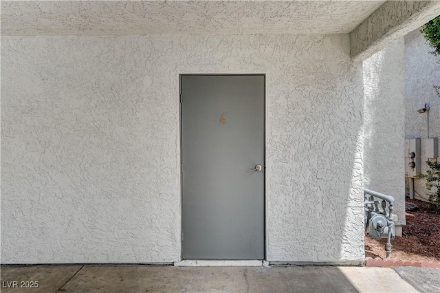 6735 W Charleston Blvd Unit 4, Las Vegas, NV 89146 - property entrance featuring stucco siding