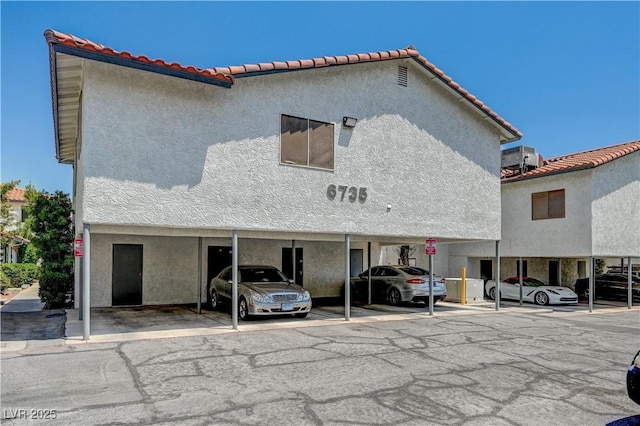 6735 W Charleston Blvd Unit 4, Las Vegas, NV 89146 - view of property with covered parking