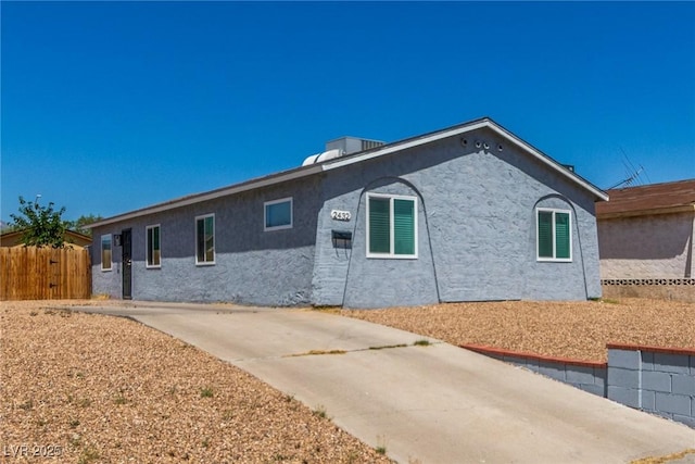 2432 Spanish Ct, Las Vegas, NV 89108 - view of side of home featuring stucco siding