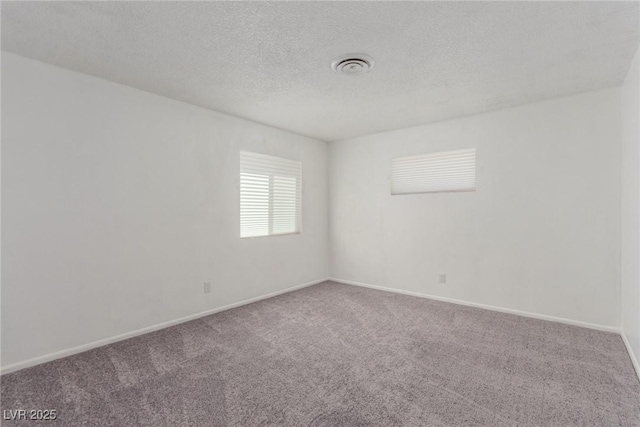 2432 Spanish Ct, Las Vegas, NV 89108 - carpeted spare room with baseboards and a textured ceiling