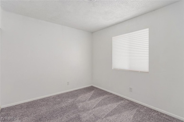 2432 Spanish Ct, Las Vegas, NV 89108 - carpeted empty room featuring baseboards and a textured ceiling