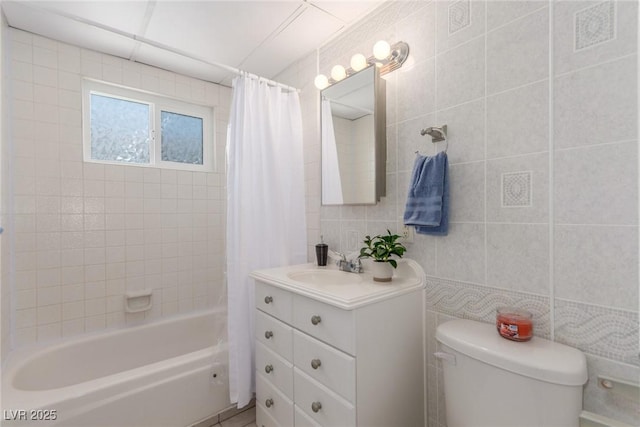 2432 Spanish Ct, Las Vegas, NV 89108 - full bath featuring vanity, toilet, shower / tub combo, tile walls, and backsplash