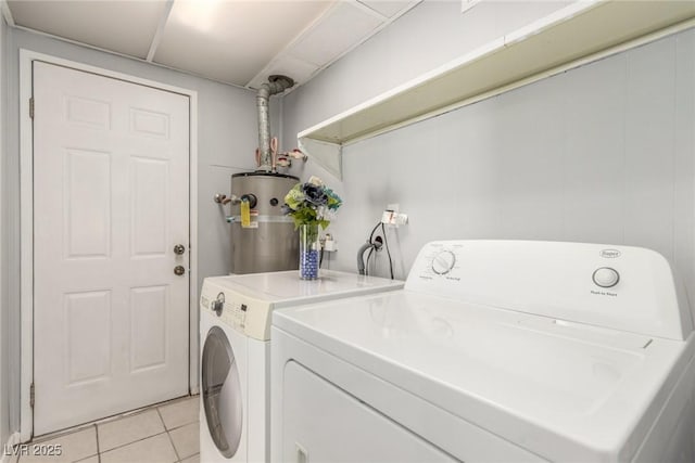 2432 Spanish Ct, Las Vegas, NV 89108 - laundry room with gas water heater, independent washer and dryer, and light tile patterned floors