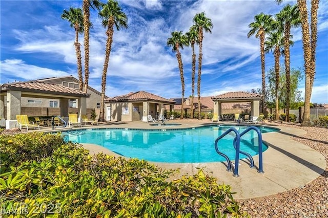 9621 Donner Springs Ave, Las Vegas, NV 89148 - community pool featuring a gazebo and a patio area