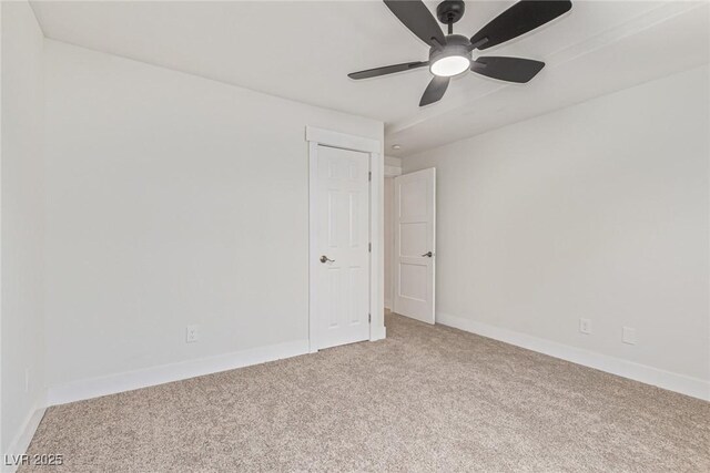 659 D Ave, Boulder City, NV 89005 - unfurnished room featuring light carpet, baseboards, and ceiling fan