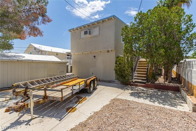 659 D Ave, Boulder City, NV 89005 - back of property featuring stairs and a patio