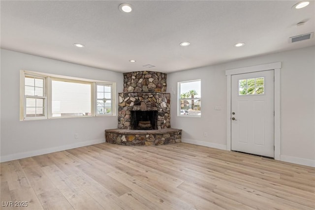 659 D Ave, Boulder City, NV 89005 - unfurnished living room with healthy amount of natural light, baseboards, light wood-style flooring, and recessed lighting