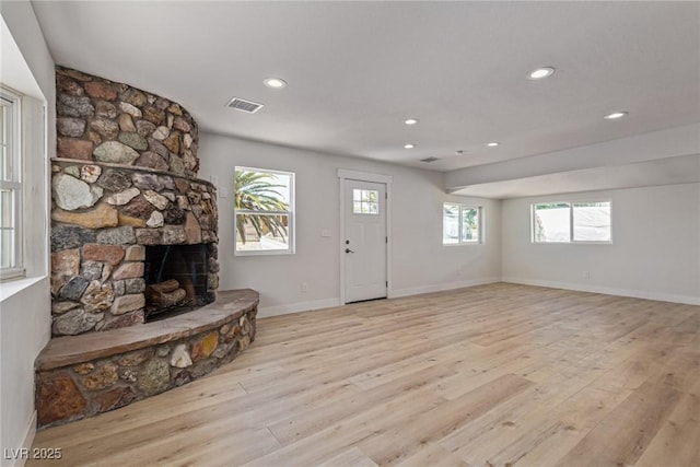 659 D Ave, Boulder City, NV 89005 - foyer featuring a stone fireplace, light wood-style flooring, recessed lighting, and baseboards