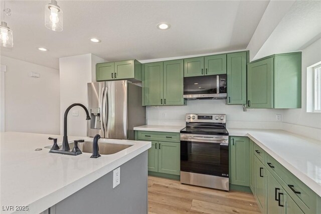 659 D Ave, Boulder City, NV 89005 - kitchen featuring stainless steel appliances, green cabinetry, a sink, and recessed lighting