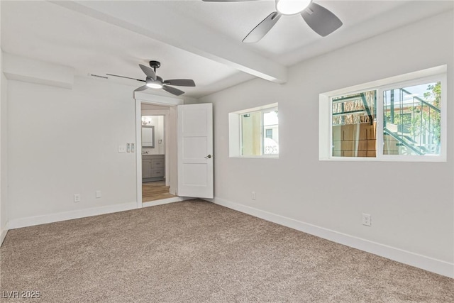 659 D Ave, Boulder City, NV 89005 - unfurnished bedroom featuring carpet, beamed ceiling, baseboards, and multiple windows