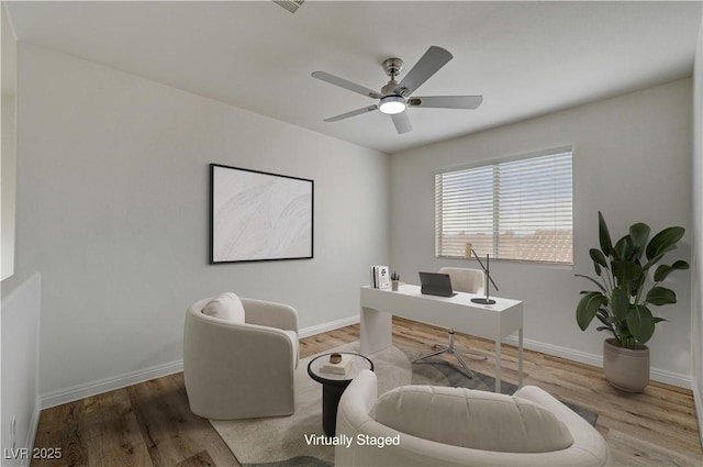 2573 Rafferty Creek Ln, Las Vegas, NV 89156 - office featuring wood finished floors, baseboards, and ceiling fan