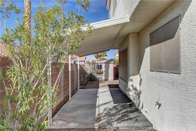 2573 Rafferty Creek Ln, Las Vegas, NV 89156 - view of property exterior featuring stucco siding and a patio area
