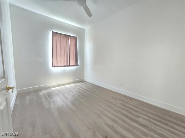 8545 Summer Vista Ave, Las Vegas, NV 89145 - unfurnished room featuring a ceiling fan, light wood-style flooring, and baseboards
