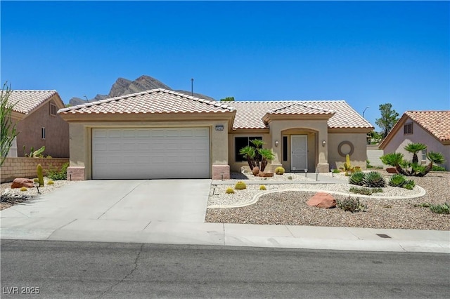 2545 Banora Point Dr, Las Vegas, NV 89134 - view of front of property with a garage, stucco siding, concrete driveway, and a tiled roof