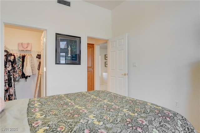 2545 Banora Point Dr, Las Vegas, NV 89134 - bedroom featuring a walk in closet and a closet