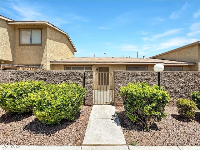 2204 Short Pine Dr, Las Vegas, NV 89108 - entrance to property with stucco siding and a gate