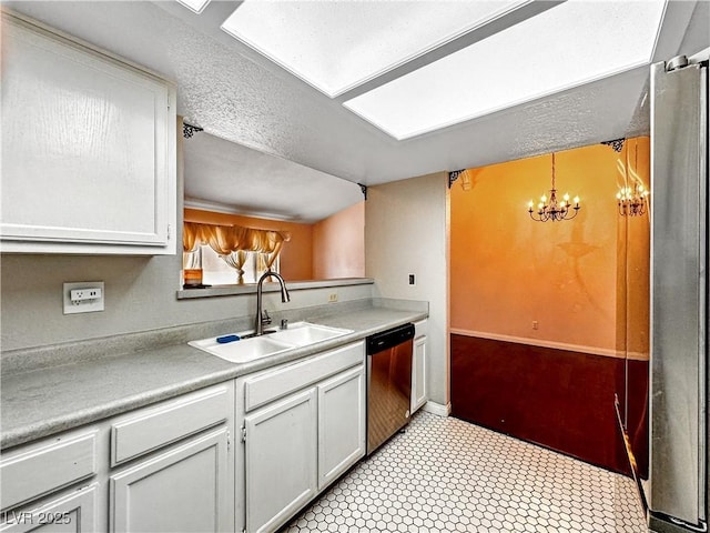 2204 Short Pine Dr, Las Vegas, NV 89108 - kitchen featuring stainless steel dishwasher, a sink, a chandelier, light countertops, and baseboards