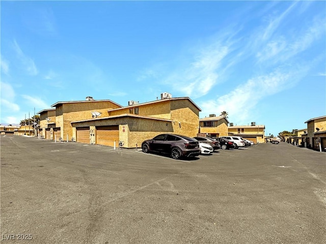 2204 Short Pine Dr, Las Vegas, NV 89108 - view of building exterior featuring uncovered parking