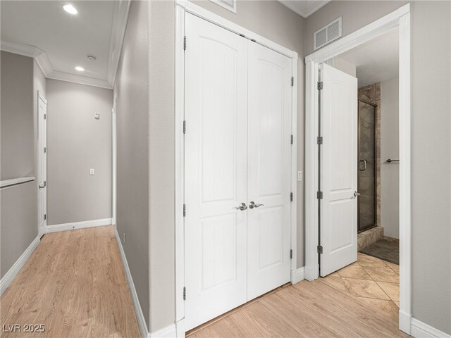 30 Via Vasari Unit 103, Henderson, NV 89011 - corridor with ornamental molding, light wood-style flooring, recessed lighting, and baseboards