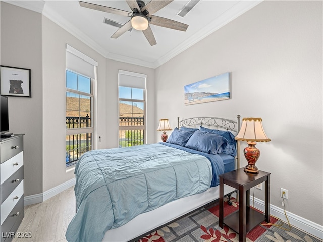 30 Via Vasari Unit 103, Henderson, NV 89011 - bedroom featuring access to exterior, crown molding, wood finished floors, baseboards, and a ceiling fan