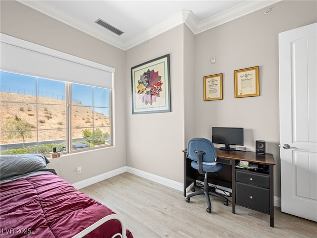 30 Via Vasari Unit 103, Henderson, NV 89011 - bedroom with light wood-style floors, baseboards, crown molding, and a desk