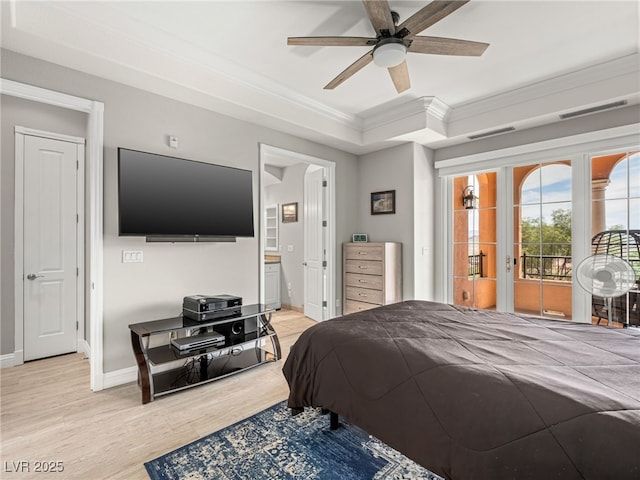 30 Via Vasari Unit 103, Henderson, NV 89011 - bedroom featuring crown molding, access to outside, light wood-style floors, baseboards, and ensuite bath