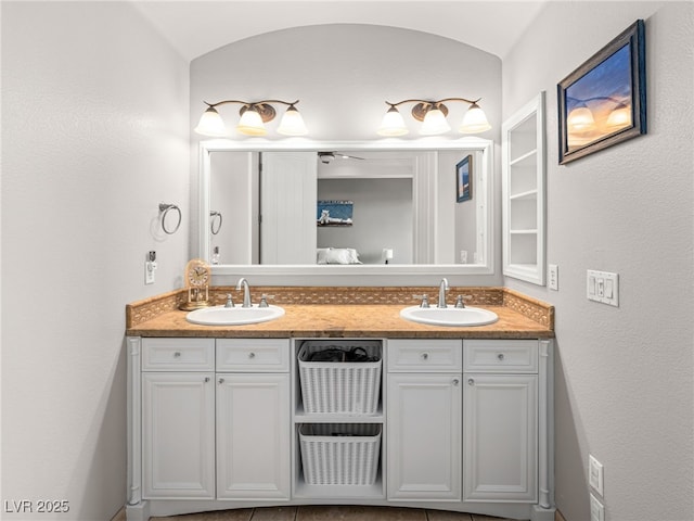 30 Via Vasari Unit 103, Henderson, NV 89011 - full bathroom with double vanity and lofted ceiling