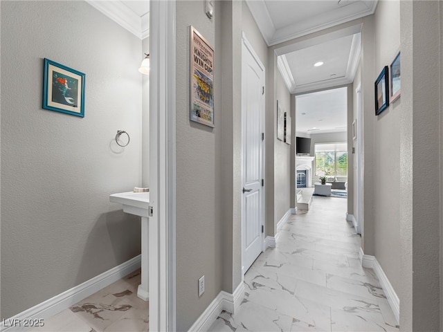 30 Via Vasari Unit 103, Henderson, NV 89011 - hallway with light marble finish flooring, crown molding, baseboards, and a textured wall