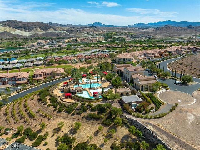 30 Via Vasari Unit 103, Henderson, NV 89011 - aerial perspective of suburban area featuring a mountain backdrop