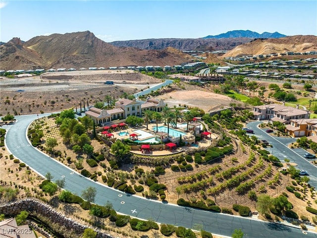 30 Via Vasari Unit 103, Henderson, NV 89011 - bird's eye view of a pool area and a mountain backdrop