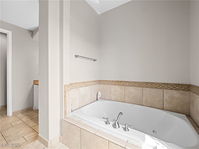 30 Via Vasari Unit 103, Henderson, NV 89011 - bathroom with a tub with jets, baseboards, and tile patterned flooring