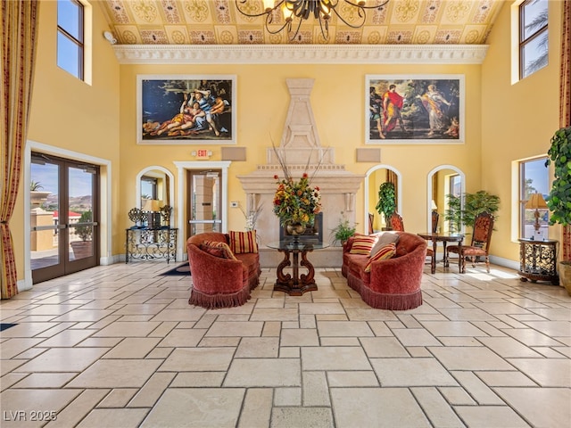30 Via Vasari Unit 103, Henderson, NV 89011 - lobby with an ornate ceiling, a towering ceiling, and ornamental molding