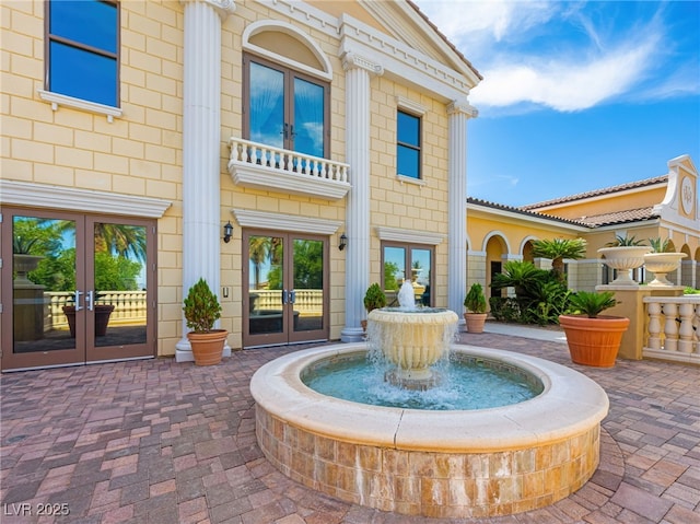 30 Via Vasari Unit 103, Henderson, NV 89011 - view of patio / terrace featuring french doors and a balcony