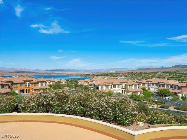 30 Via Vasari Unit 103, Henderson, NV 89011 - water view with a mountainous background and nearby suburban area
