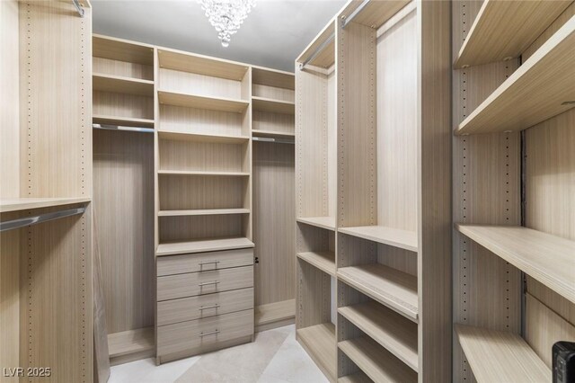 2777 Paradise Rd Unit 303, Las Vegas, NV 89109 - walk in closet with a chandelier