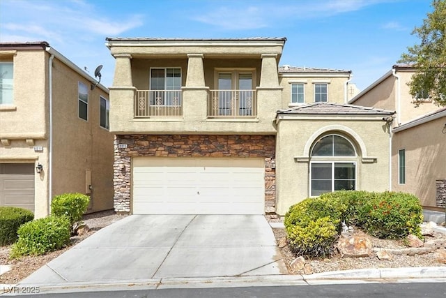 8015 Maple Park St, Las Vegas, NV 89131 - view of front facade featuring a balcony, stone siding, a garage, stucco siding, and concrete driveway