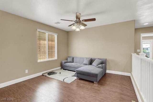 8015 Maple Park St, Las Vegas, NV 89131 - living room featuring a ceiling fan, wood finished floors, and baseboards