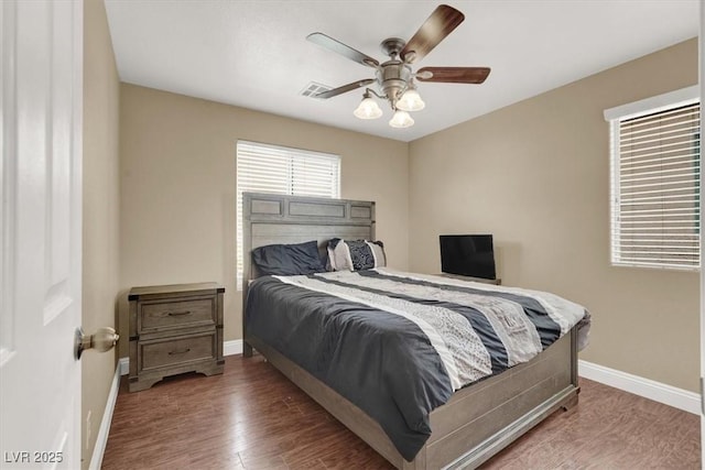 8015 Maple Park St, Las Vegas, NV 89131 - bedroom with baseboards, wood finished floors, and ceiling fan
