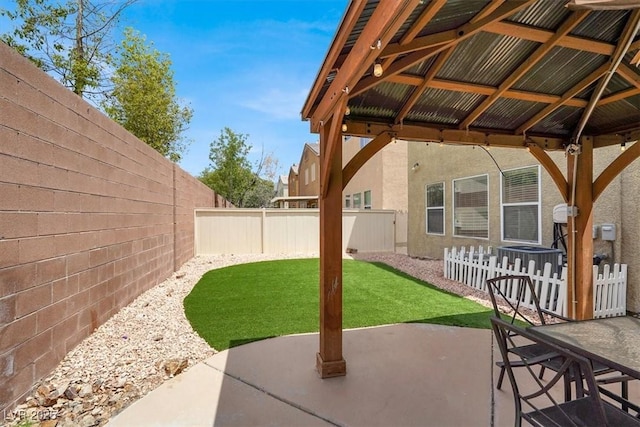 8015 Maple Park St, Las Vegas, NV 89131 - view of patio featuring a gazebo and central AC unit