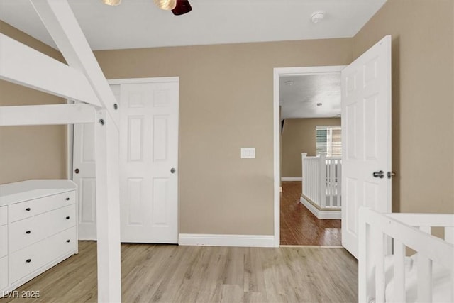 8015 Maple Park St, Las Vegas, NV 89131 - unfurnished bedroom with light wood-type flooring and baseboards