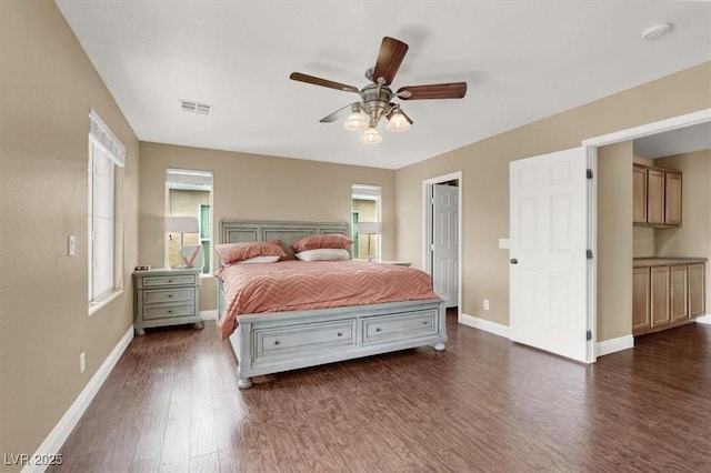 8015 Maple Park St, Las Vegas, NV 89131 - bedroom with dark wood finished floors, baseboards, and ceiling fan