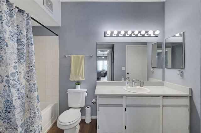 6650 W Warm Springs Rd Unit 1083, Las Vegas, NV 89118 - full bath with vanity, wood finished floors, toilet, shower / bath combo, and baseboards