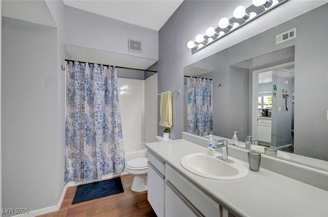 6650 W Warm Springs Rd Unit 1083, Las Vegas, NV 89118 - full bath with vanity, wood finished floors, toilet, and shower / bathtub combination with curtain